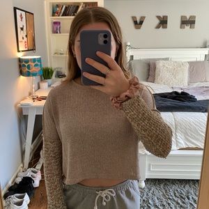 Light tan cropped sweater with knit arms